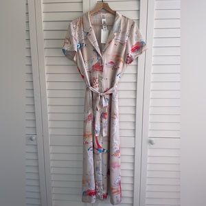 T- Shirt dress. Brand new with tags, impeccable quality. Size Large.